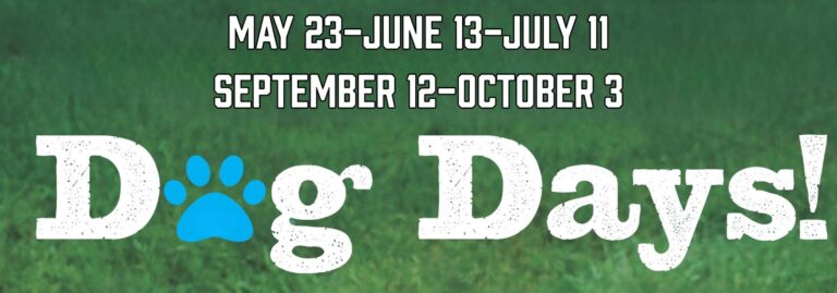 Dog Days - Visit Angel Fire New Mexico Green grass banner with large white distressed text 'Dog Days!' and a blue paw print between D and og, with dates above: May 23–June 13–July 11 and September 12–October 3.